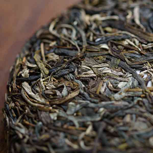 昔归熟普洱茶价格375克：探究昔归普洱茶的价格与口感，生茶与熟茶的差异。