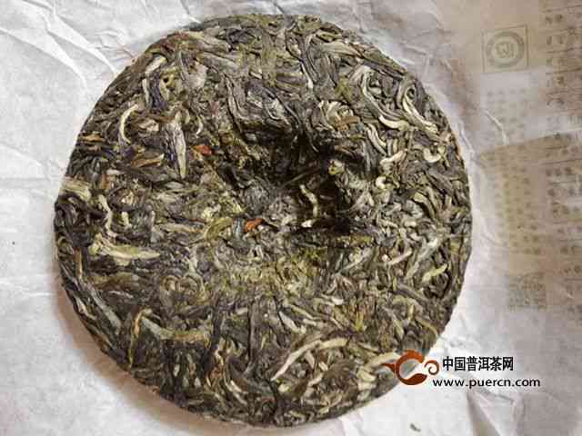 茉莉普洱茶饼七彩云南价格与功效：详解七彩云南茉莉青饼、花茶与大叶晒青茶