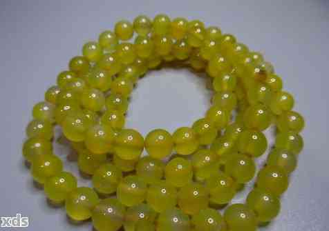 如何评估鲜亮黄翡翠珠子的珍贵程度和市场价值？