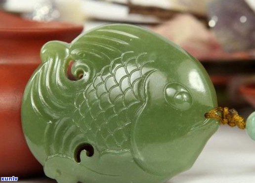 和田玉双鱼挂件的文化寓意与象征价值探究