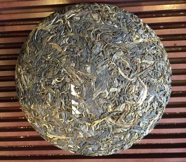 云峰号普洱茶：古树原料，优质工艺，云南云峰茶业出品。