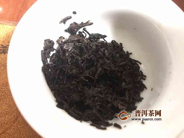 俊仲号老树普洱茶熟茶2013多少钱及2019价格对比