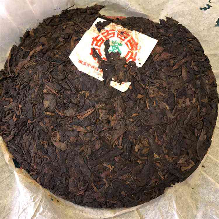 洱兴茶厂330克熟茶价格越陈越香云南洱兴茶厂05年茶饼