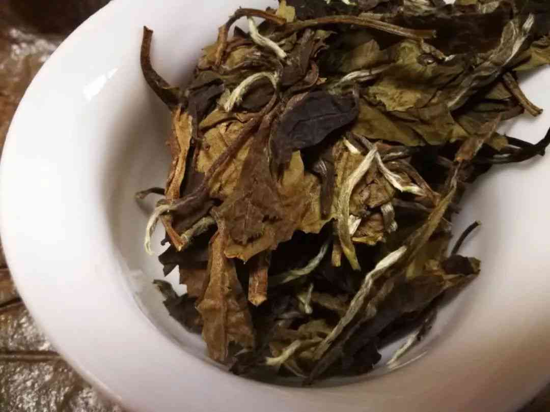 新2007年老叶普洱茶熟砖枣香茶价格及批发货源分析