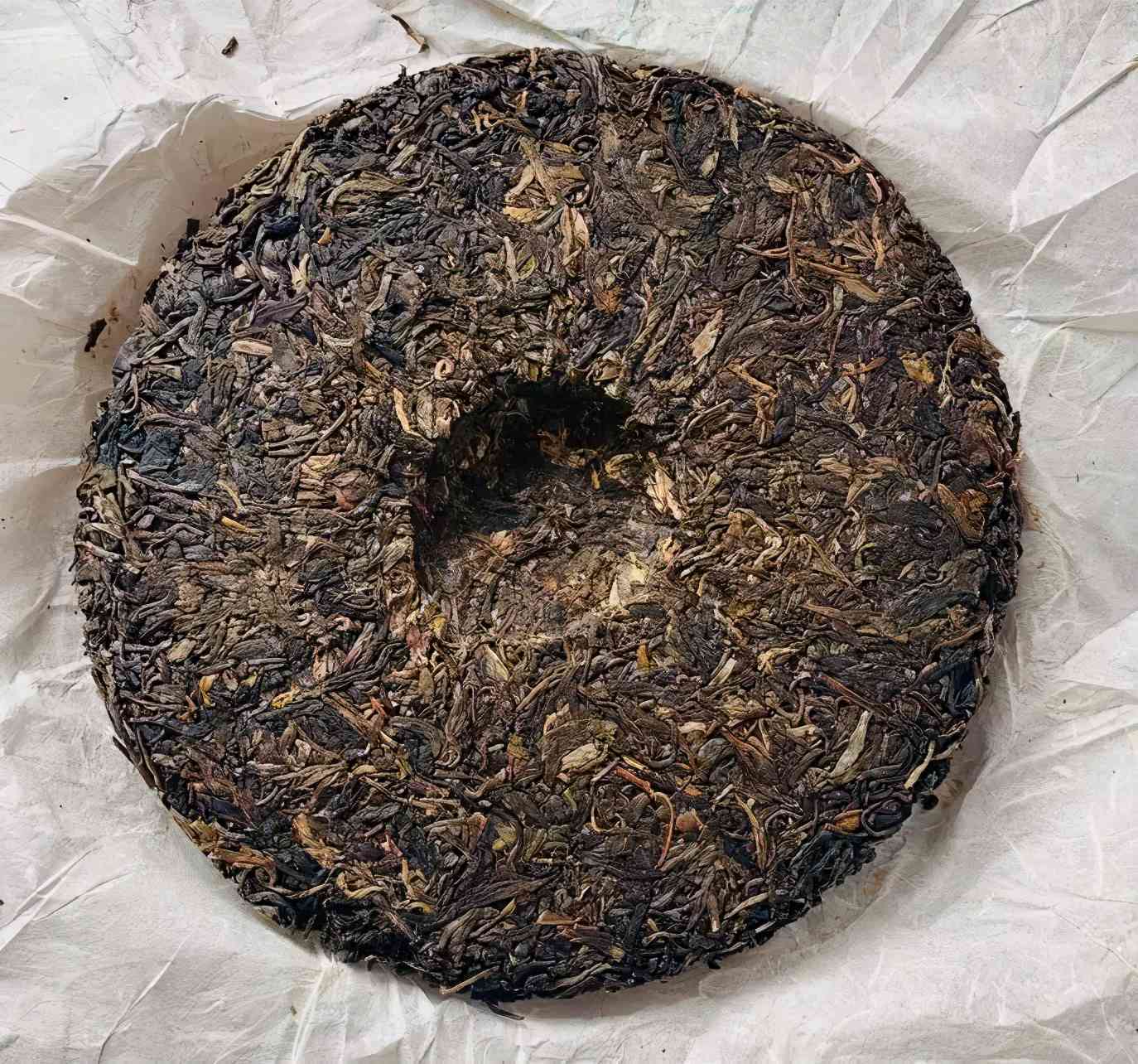 普洱茶制作过程：如何将散茶叶制成茶饼？