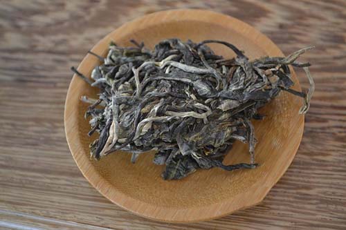 新 '昆明正宗普洱茶价格指南：熟茶、生茶一斤多少钱？'