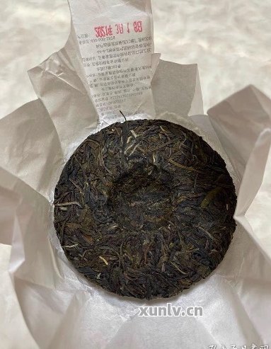 古朴典雅，品味普洱：牛皮纸袋装普洱茶饼的艺术与工艺