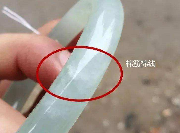 和田玉的两种纹理：水线与棉线对品质的影响探讨