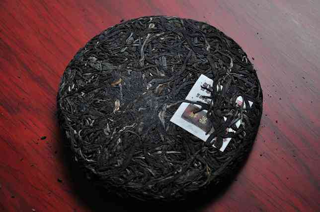 2009年老班章熟茶饼价格及300年树龄2015年茶饼特点